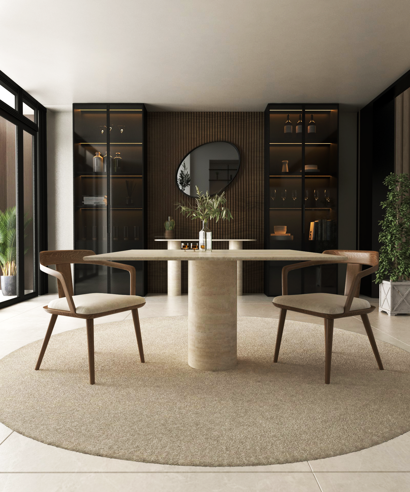 A modern dining room with the TRAVERTABLE Square Travertine Dining Table featuring a cylindrical center base and pure travertine stone, two wooden chairs, a round wall mirror, glass cabinets, potted plants, and neutral minimalist decor.