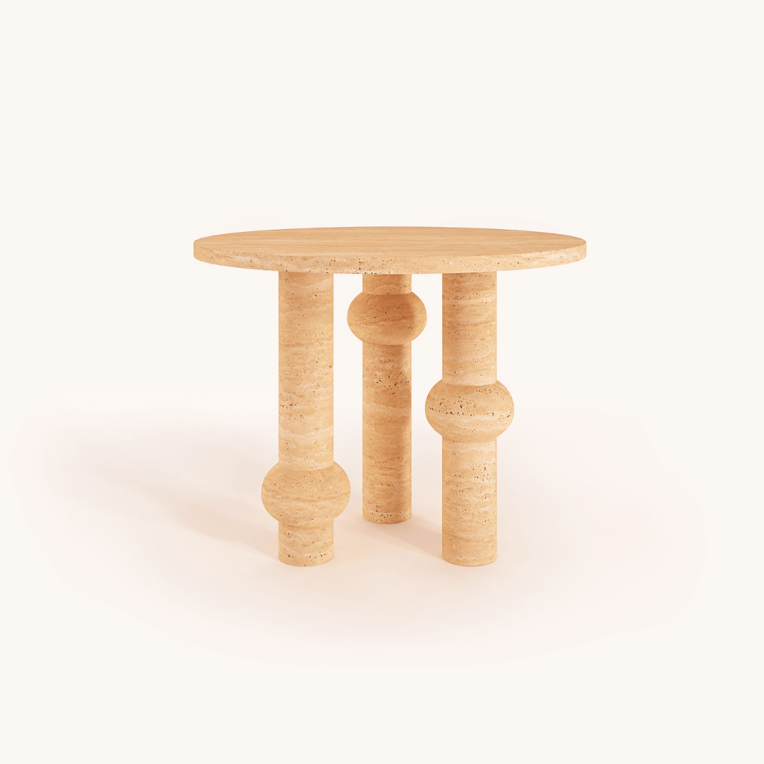 The Opulent Round Travertine Dining Table by Travertable features a round wooden top with three uniquely shaped solid cylindrical legs and varying thicknesses. Its light natural finish stands out against a white background, offering customizable luxury dining options.