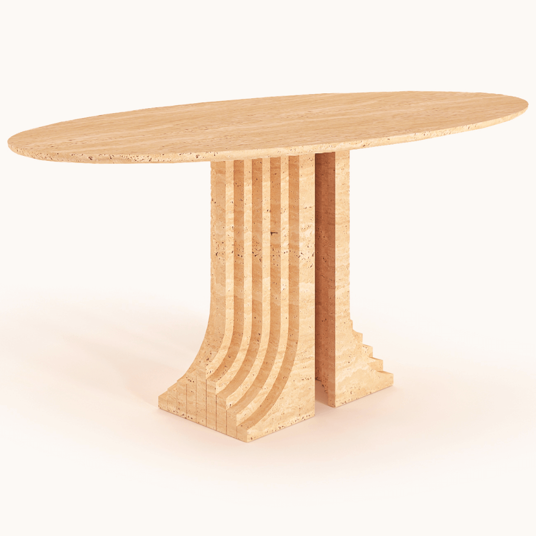 The Aurora Travertine Dining Table by Travertable boasts an elegant oval wooden design with an architectural base of stacked, vertically-aligned segments. Its light natural wood finish and customization options enhance its stylish, modern aesthetic for a personalized touch.