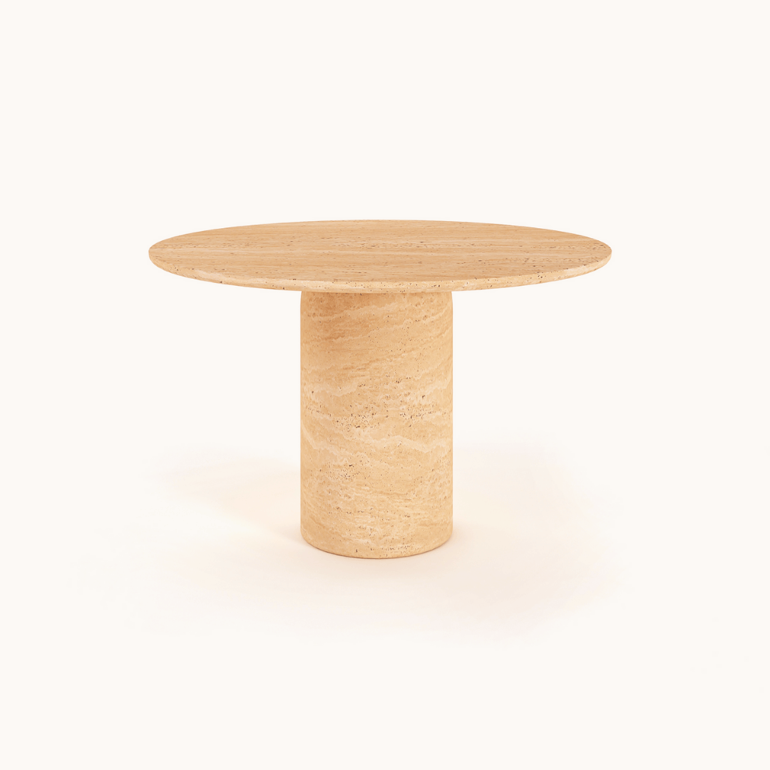 The Chic Oval Travertine Dining Table by Travertable, featuring a smooth surface and cylindrical base, is placed against a plain white background, adding elegance to any space.