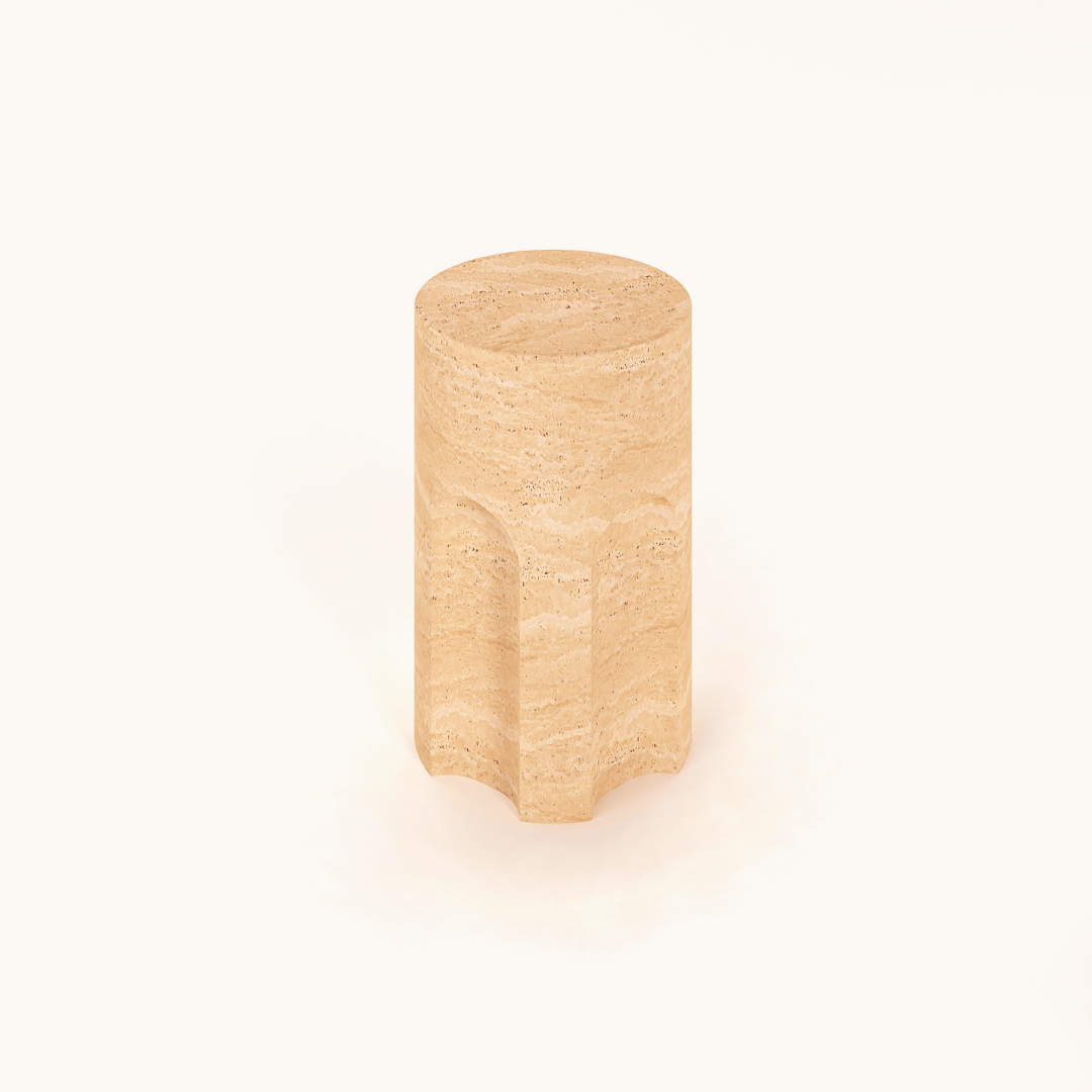 A Handcrafted Travertine Marble Side Table by Travertable, featuring a cylindrical beige design with a smooth top and gently indented sides, set against a plain white background.