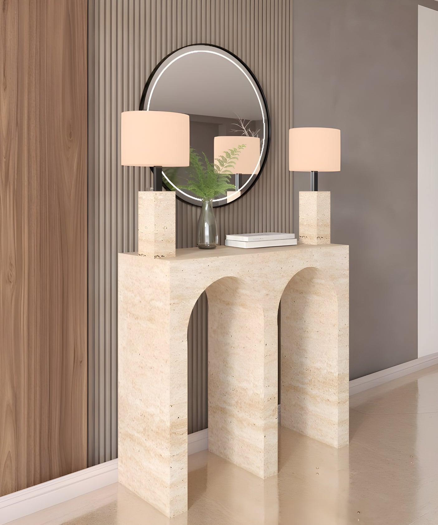 The TRAVERTABLE Travertine Console Table with Two Arches brings modern style to your space, topped with square-based lamps and accented by a round mirror and a glass vase with greenery for a refined statement look.
