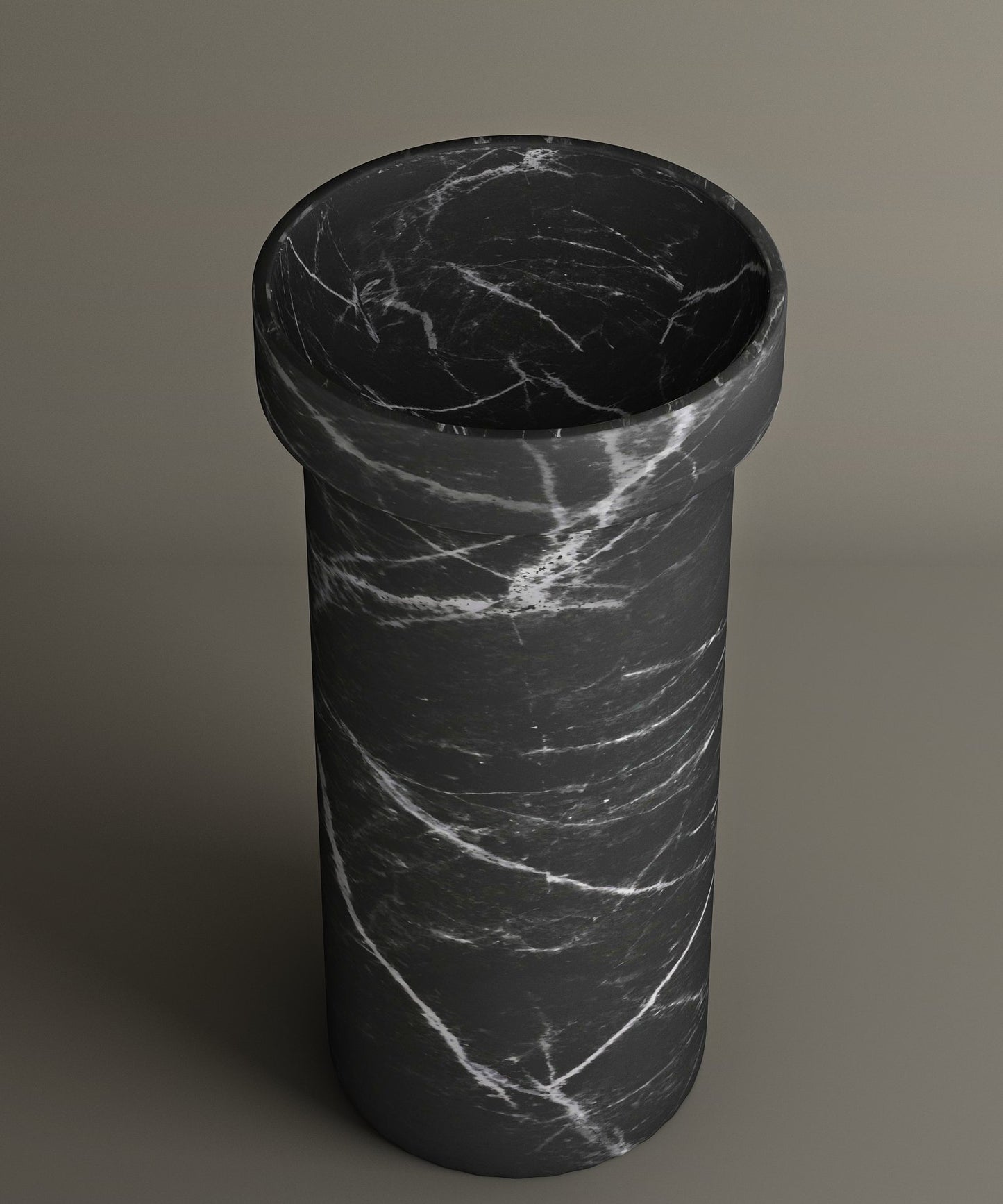 The TRAVERTABLE Nero Marquina Marble Pedestal Vanity Sink features a cylindrical silhouette, striking white veining, and an integrated basin for a seamless lookβperfect for modern interiors.
