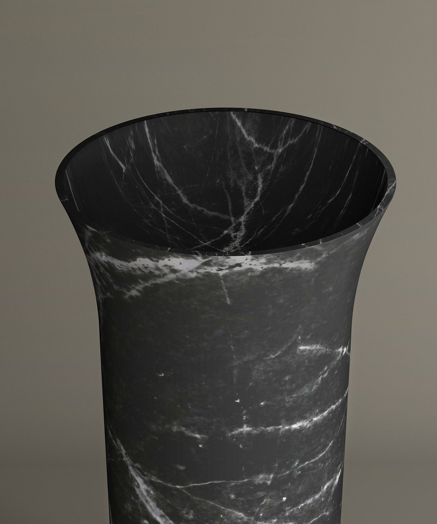 The TRAVERTABLE Nero Marquina Marble Cylinder Pedestal Vanity Sink features striking white veining on black marble, its elegant cylindrical form flaring outward at the top for a sculptural look against any neutral backdrop.