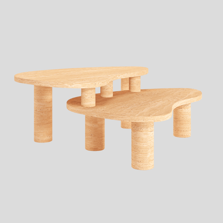 Pair of handcrafted Vintage-Inspired Travertine Coffee Tables by Travertable, featuring mid-century modern design with natural veining. Irregular oval tops and cylindrical legs in varying heights offer a layered look against a plain light grey backdrop, enhancing their authentic charm.