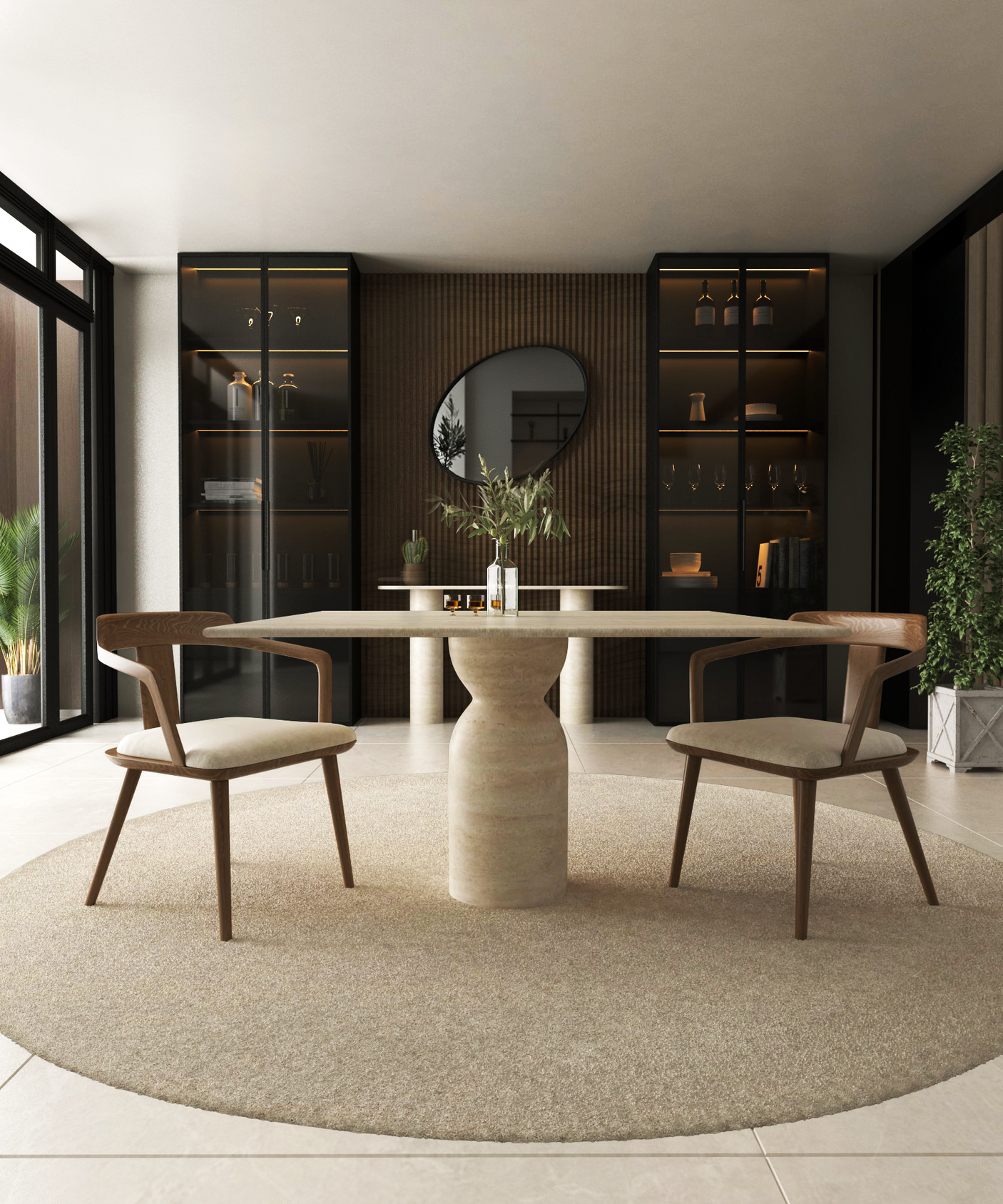 A modern dining room showcases the TRAVERTABLE Square Travertine Dining Table with Sculptural Round Center Base, two wooden chairs, a beige rug, a round mirror, shelves with glassware, potted plants, and large windows for timeless natural light.