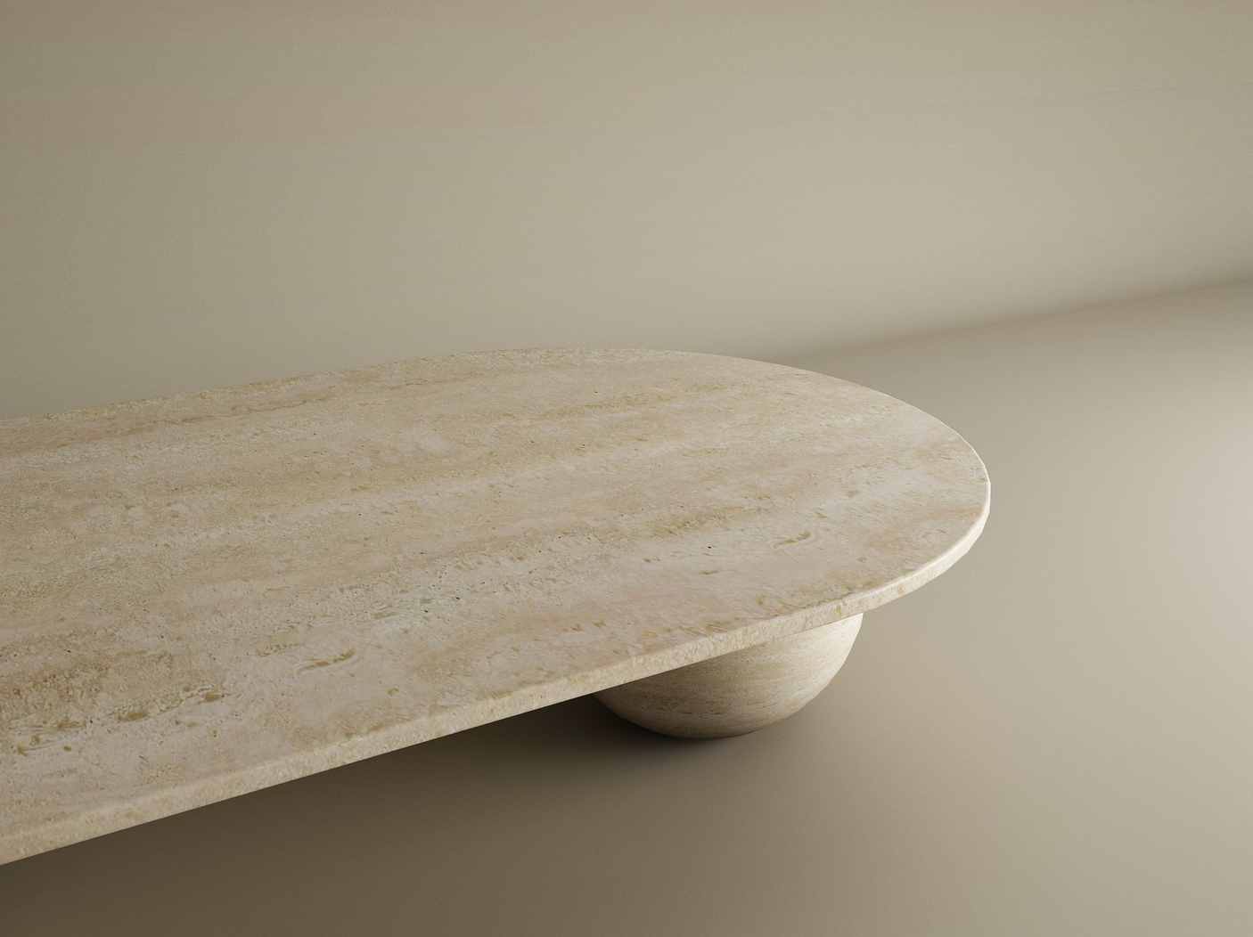 A minimalist photo showcases the TRAVERTABLE Oval Travertine Coffee Table with Stone Ball Base – Artistic Travertine – Customizable, featuring a beige surface and sculptural base. Soft lighting and a neutral background emphasize its modern craftsmanship.