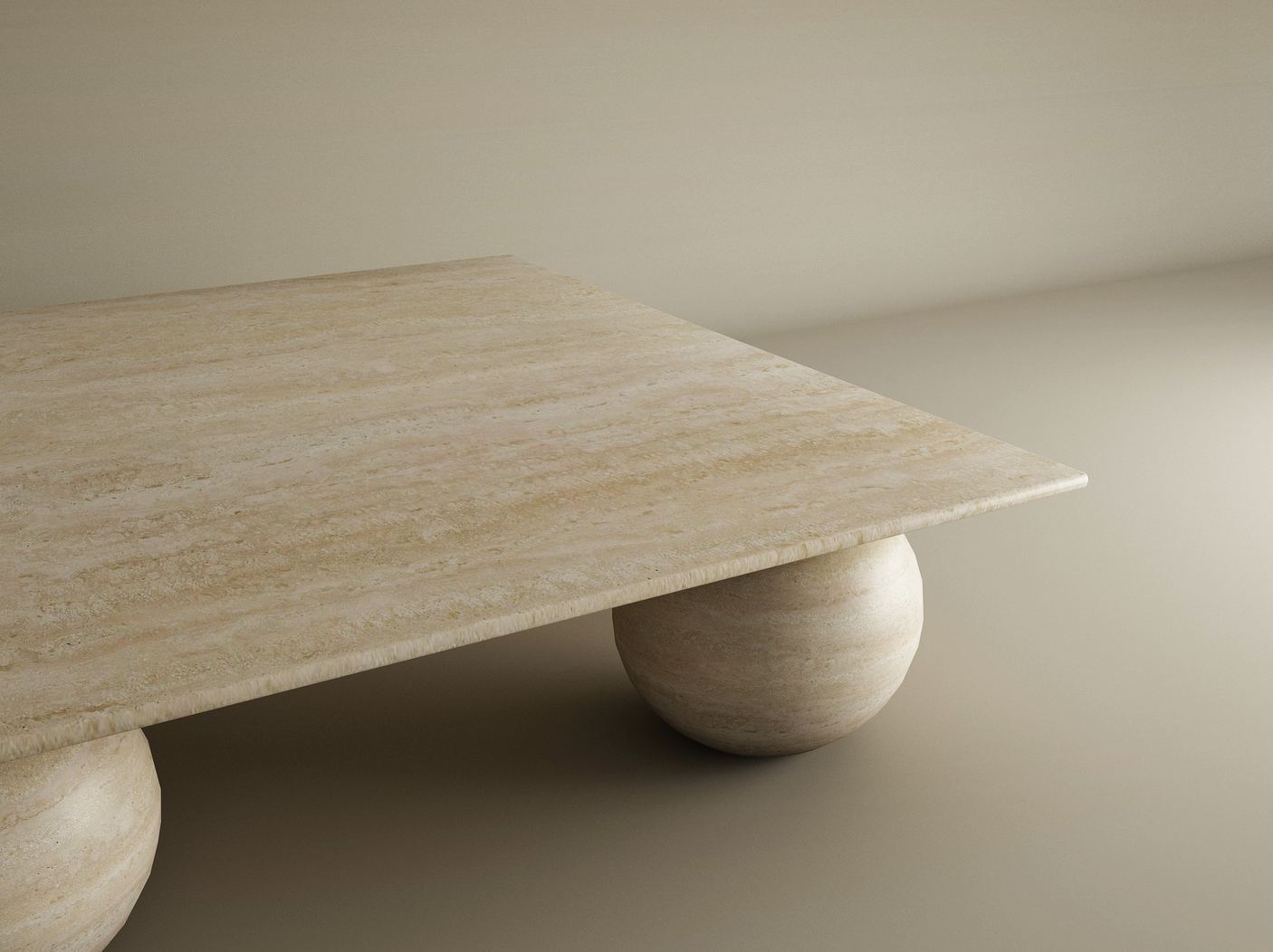 The TRAVERTABLE Square Travertine Coffee Table features a thick slab top and sculptural stone ball base. Its smooth, neutral setting highlights the table’s clean, organic feel. Customizable for your space.