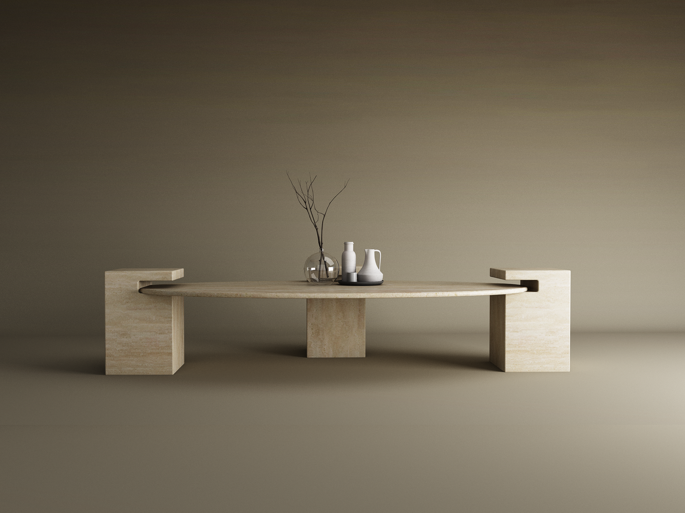 The TRAVERTABLE Ellipse Travertine Coffee Table with Square Base in Timeless Travertine features a stone top, three rectangular legs, and two side cut-outs. Styled with a glass vase of branches, white pitcher, and dark cup on a plain beige background.