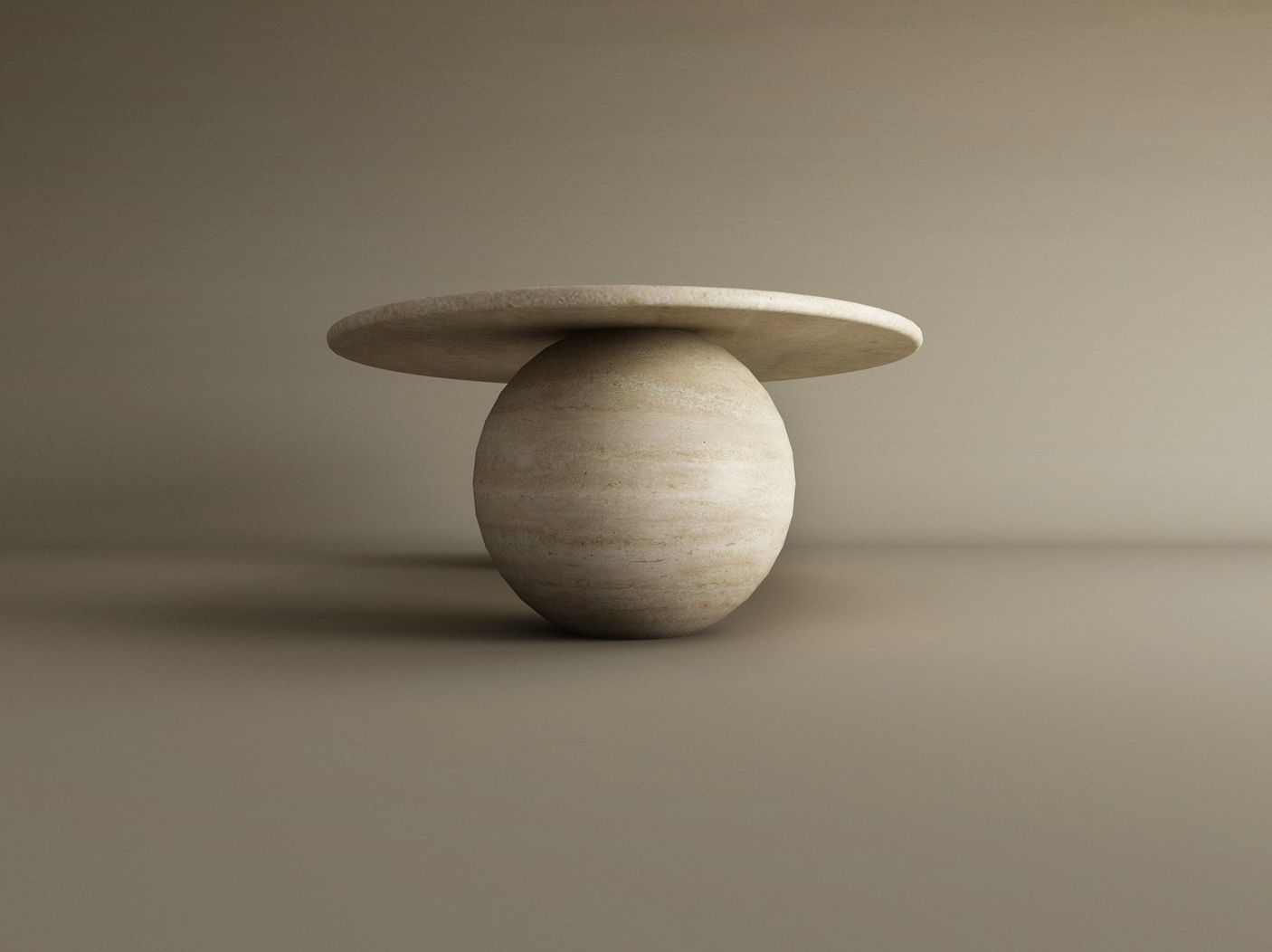 The TRAVERTABLE Ellipse Travertine Coffee Table with Stone Ball Base features a minimalist, sculptural stone design in light beige. Its round flat top and simple modern form cast soft shadows against a neutral background. Customizable options available.