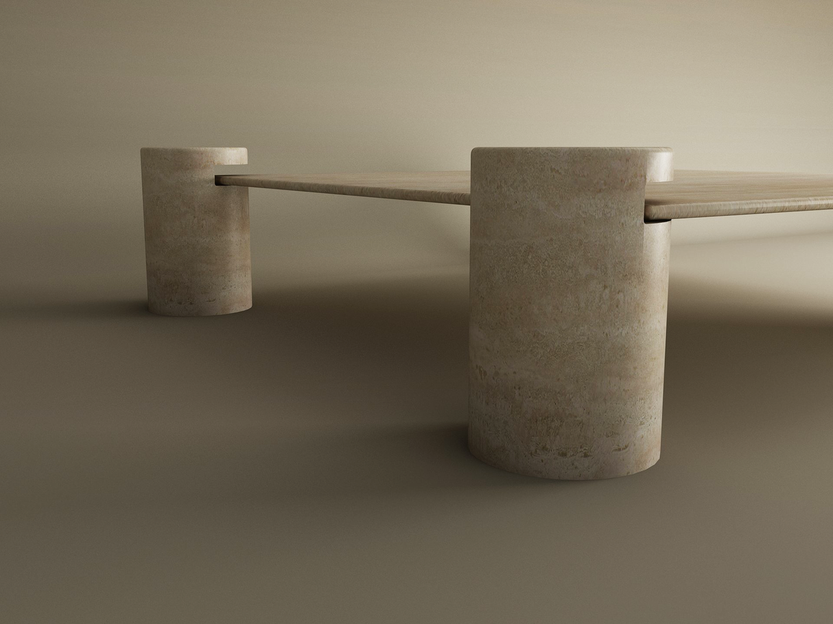 The TRAVERTABLE Square Travertine Coffee Table features a pure travertine stone top and sturdy cylindrical legs, offering customizable elegance that complements neutral spaces with a minimalist design.