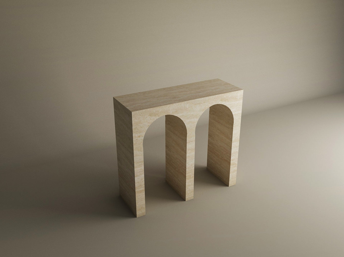 The TRAVERTABLE Travertine Console Table features a solid stone build and two arch-shaped legs, creating a customizable statement piece that showcases minimalist geometric design in a softly lit, neutral space.