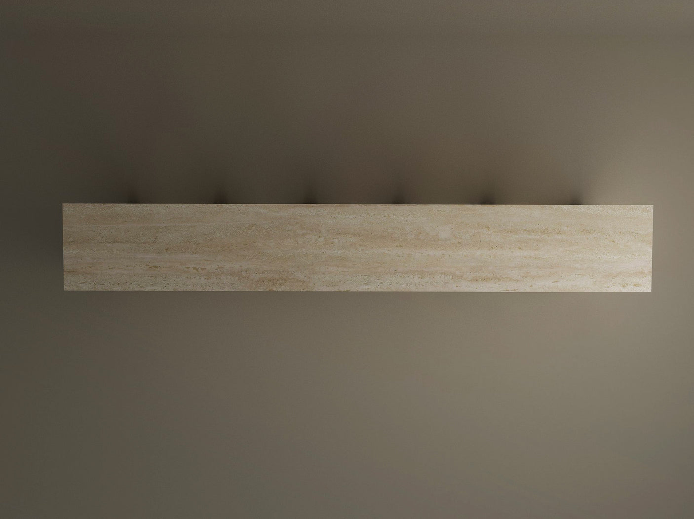 The TRAVERTABLE Travertine Console Table with Five Arches, a grand architectural statement, is mounted horizontally on a plain grey wall, its sculptural design casting subtle shadows and bringing customizable understated luxury to any space.