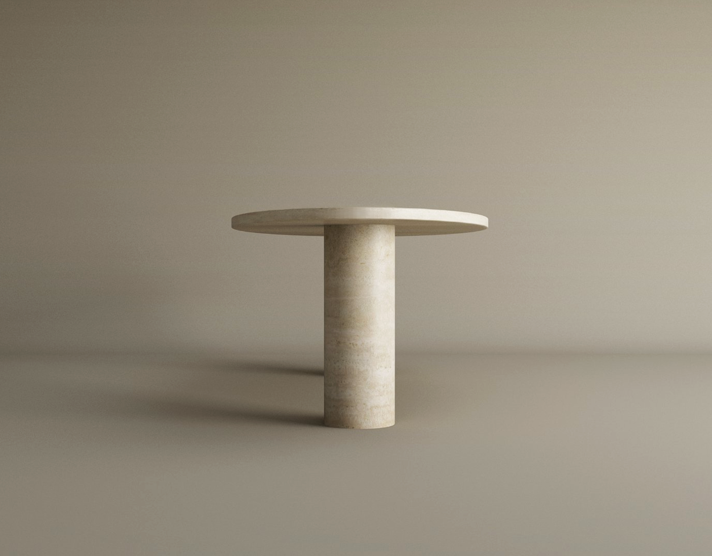 The TRAVERTABLE Ellipse Travertine Coffee Table features a smooth, flat real stone top with natural veining and a solid cylindrical base, set against a plain beige background. Customizable and crafted for organic elegance.