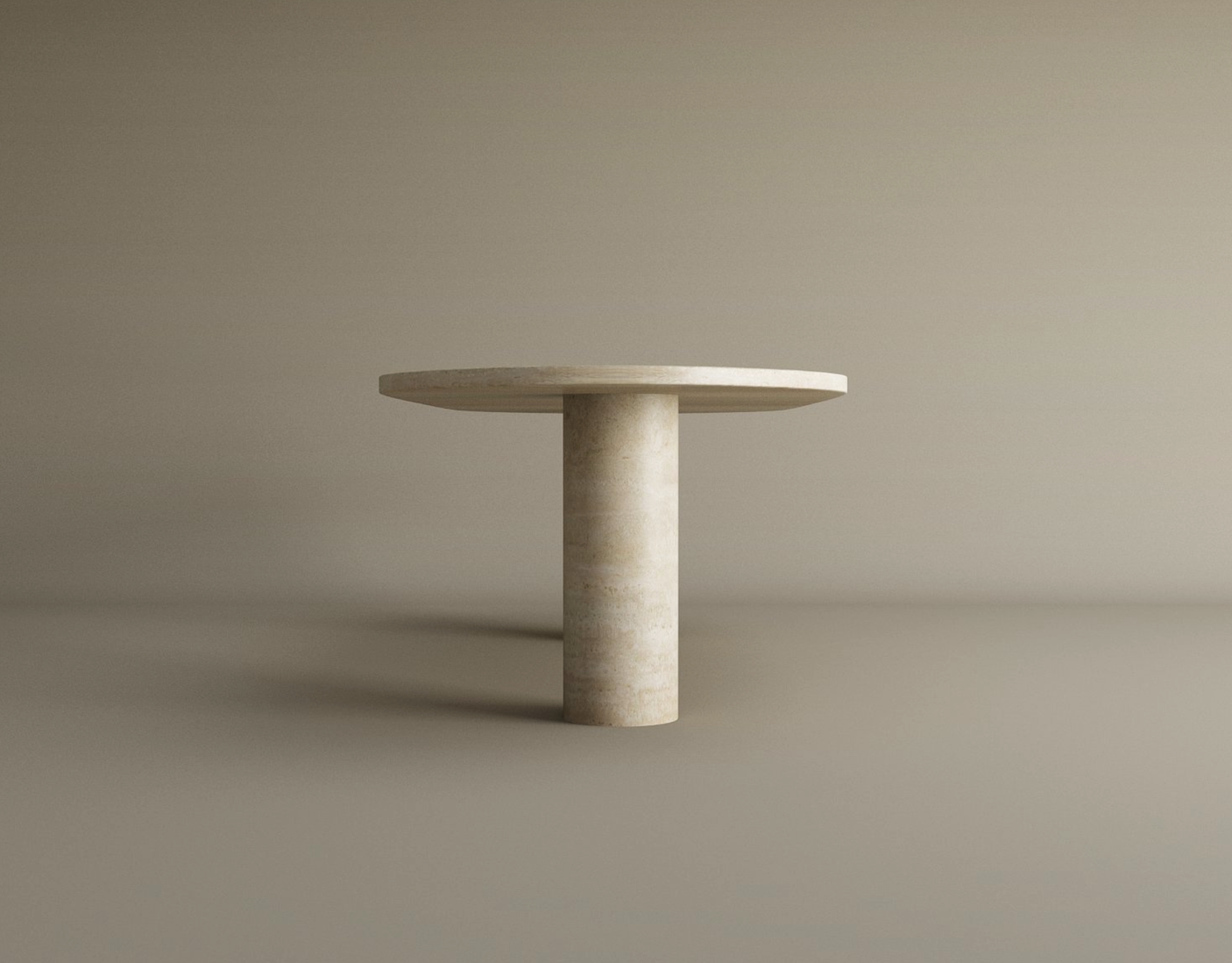 The TRAVERTABLE Oval Travertine Coffee Table features a solid cylindrical base and natural stone veining, offering a minimalist, modern look. Shown against a plain beige background. Customizable design.