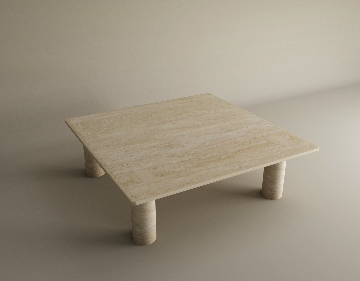 The TRAVERTABLE Square Travertine Coffee Table features a smooth, light beige natural stone top and solid cylindrical base, placed on a matching light floor against a plain wall. Customizable and crafted from pure travertine stone.
