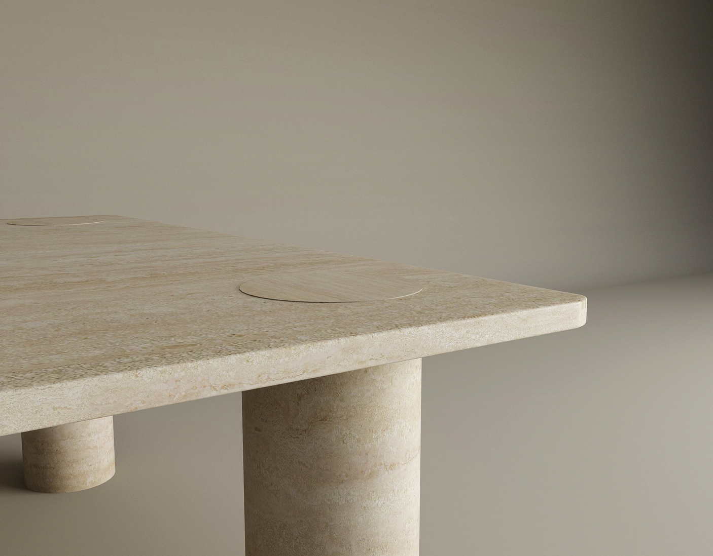 A close-up of the TRAVERTABLE Square Travertine Coffee Table shows its pure travertine stone top, featuring natural circular patterns, and solid cylindrical base, set against a neutral background. The table is customizable for your space.