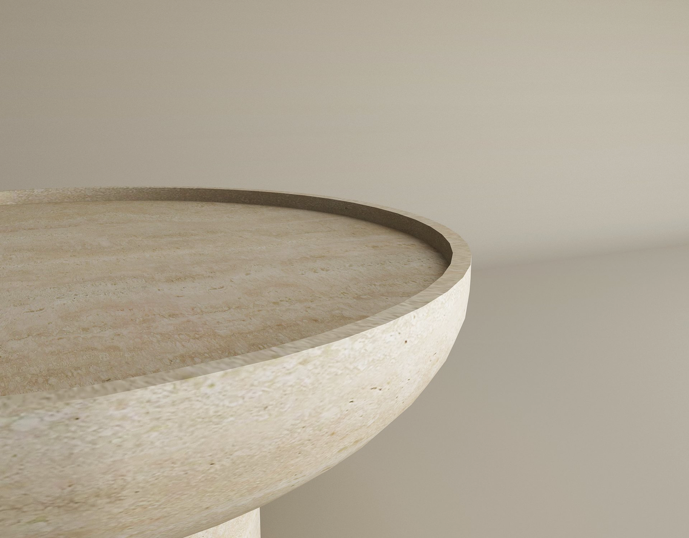 The TRAVERTABLE Round Travertine Coffee Table with Solid Cylindrical Base features pure, customizable travertine stone and a raised rim. Its smooth beige surface adds natural elegance to minimalist living spaces with softly lit light beige walls.