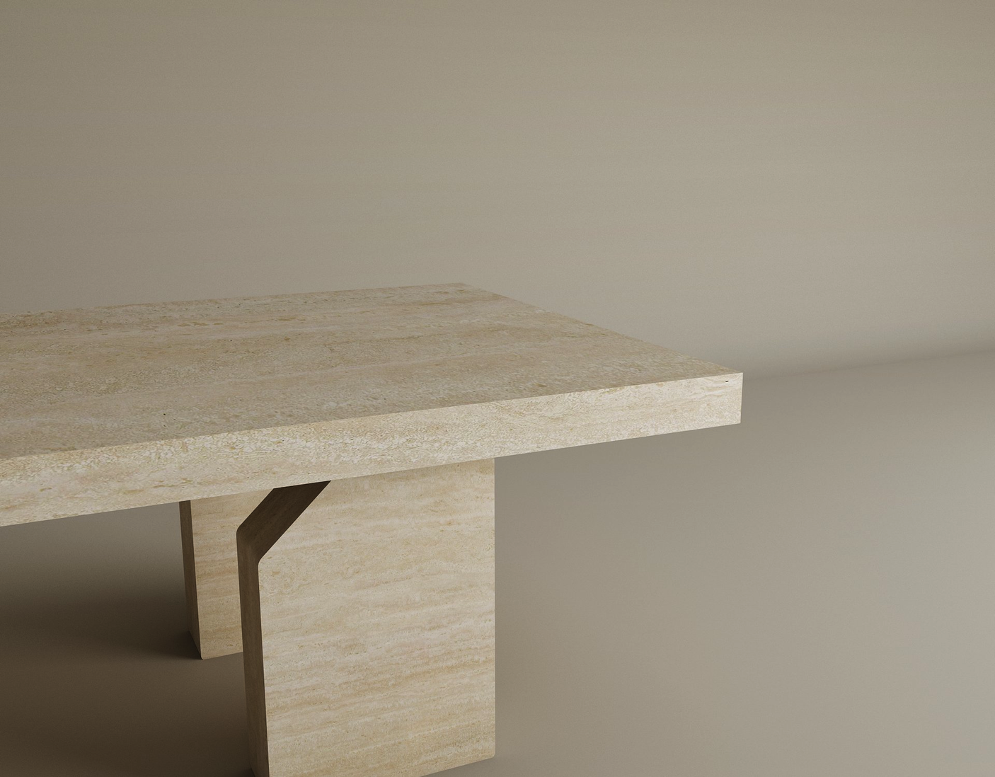 The TRAVERTABLE Architectural Travertine Coffee Table with a sculptural base and timeless natural stone sits against a light taupe background, its clean lines and organic design partially visible, highlighting customizable elegance.