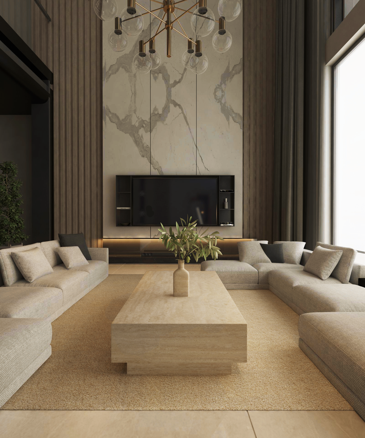 A modern living room features beige sectional sofas in a U-shape around the TRAVERTABLE Rectangular Travertine Coffee Table with Hidden Base. A vase with greenery decorates the table, while a large TV is mounted on a marble accent wall. Tall windows brighten the space.