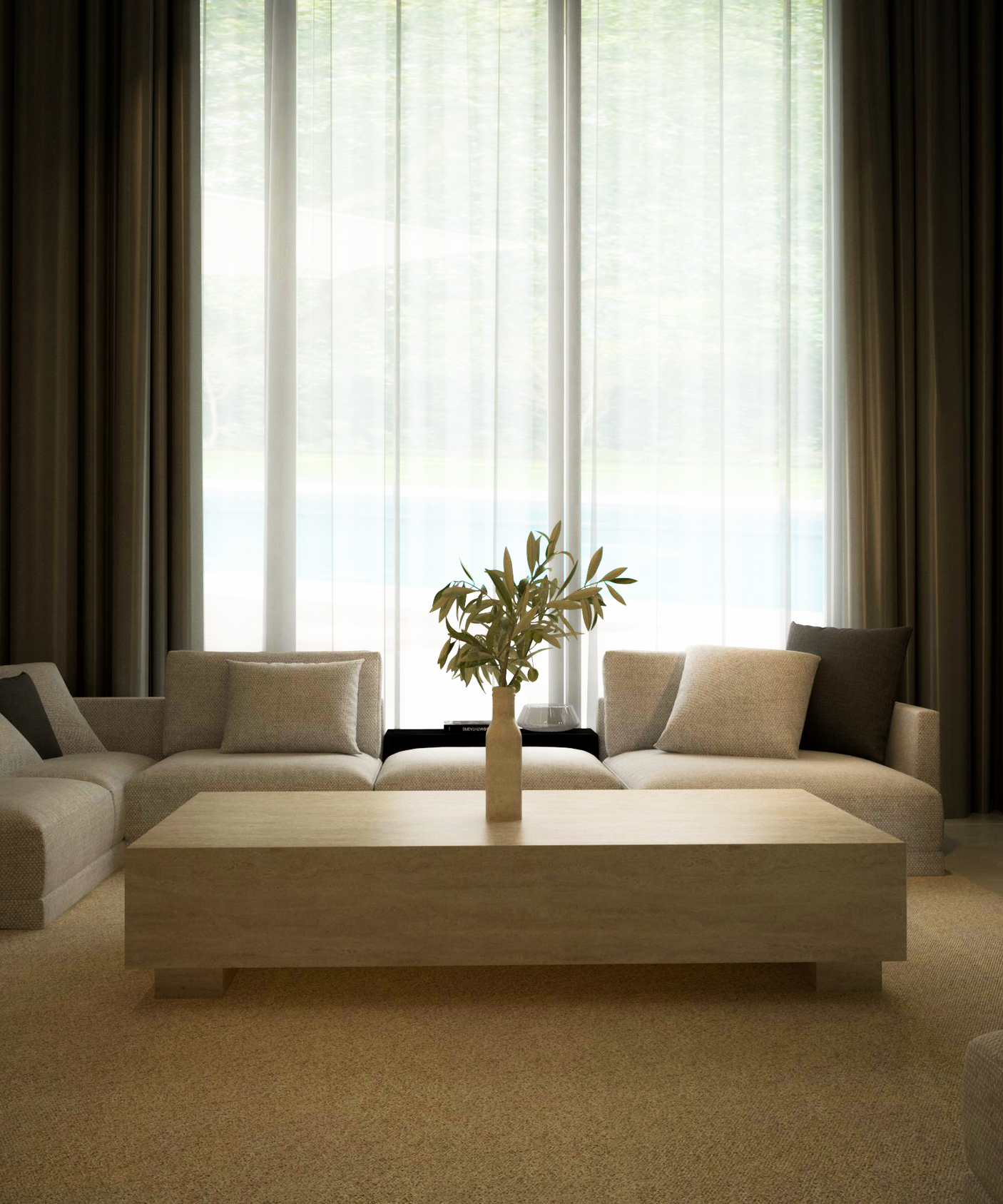 A modern living room with beige sofas, gray accent pillows, sheer curtains, and a TRAVERTABLE Rectangular Travertine Coffee Table with Hidden Base. A vase with green foliage adds to the minimal, calming decor as soft natural light fills the space.