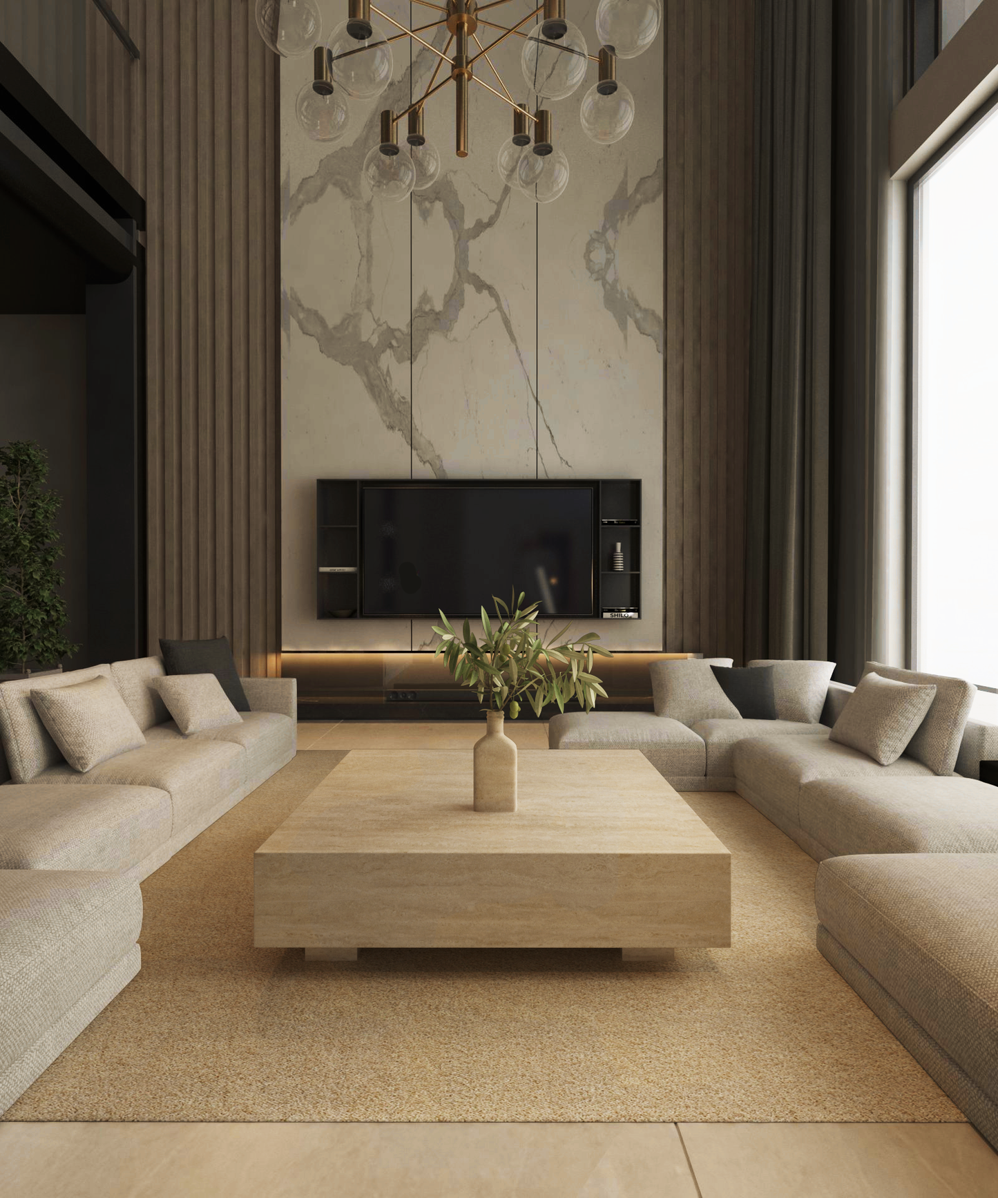Modern living room with neutral tones, showcasing two large beige sectionals facing the TRAVERTABLE Square Travertine Coffee Table with Hidden Base. A wall-mounted TV sits above a floating console on a marble accent wall, brightened by tall windows.
