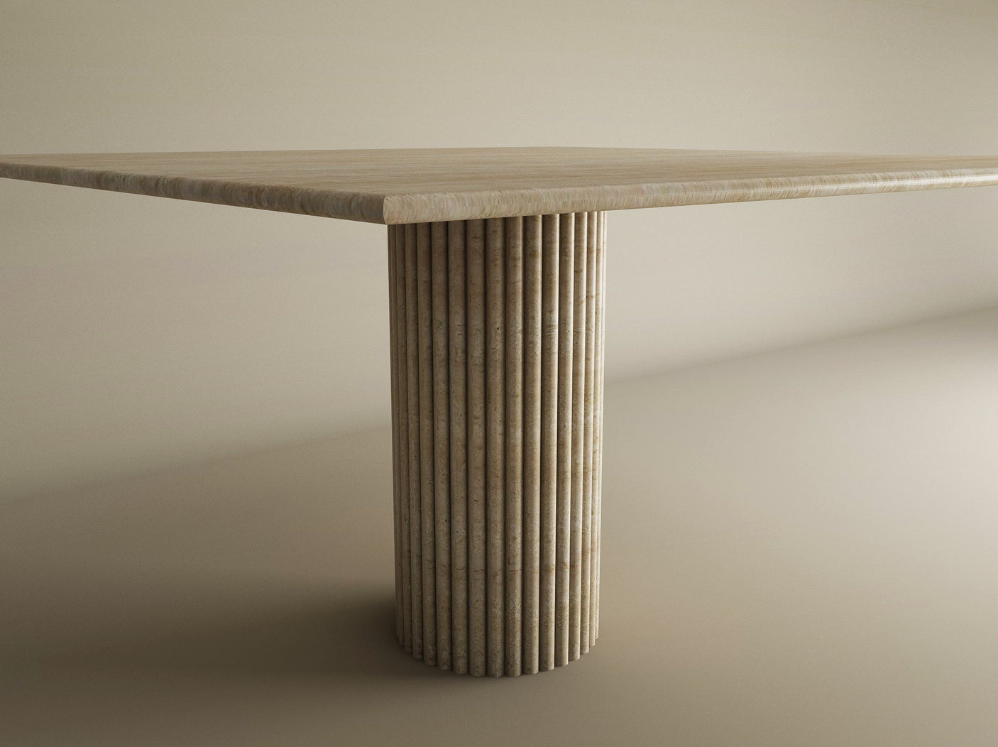 The TRAVERTABLE Square Travertine Dining Table features a smooth solid travertine top and a fluted round center base, combining minimalist design with light natural stone, perfect for modern dining spaces. Customizable options available.