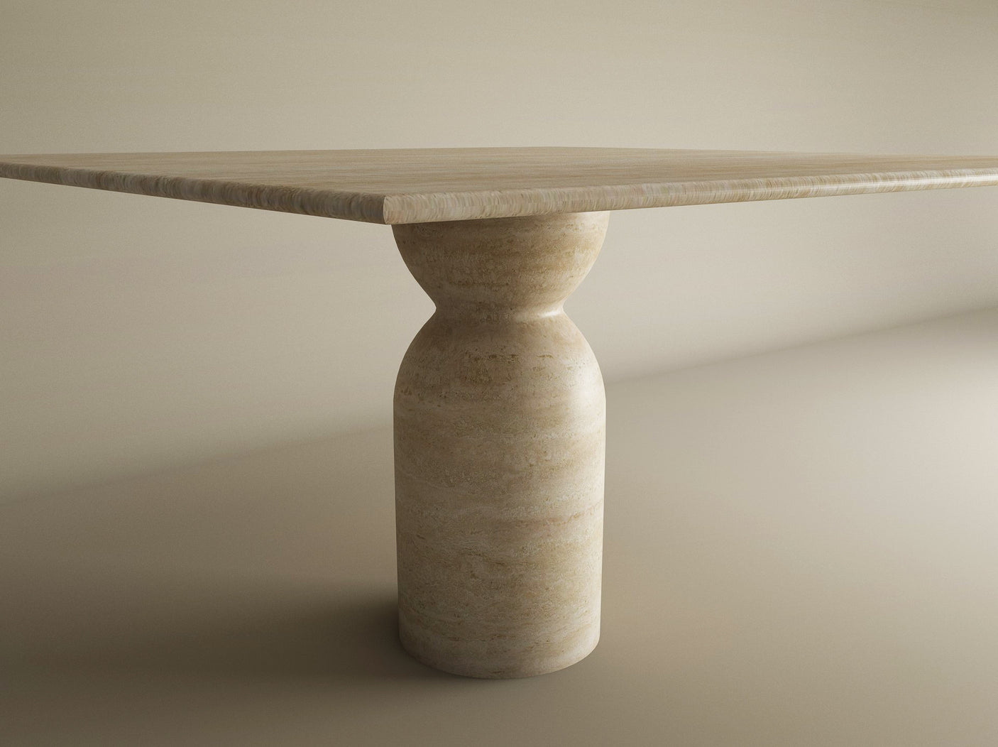 The Square Travertine Dining Table by TRAVERTABLE features a square top on a sculptural round center base with an organic stone form, set against a plain, neutral background.