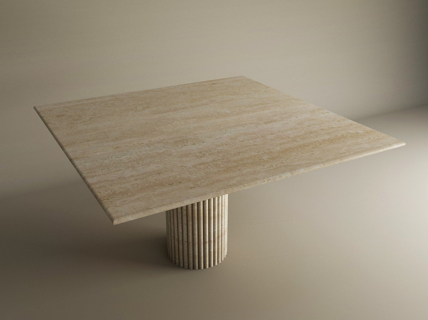 The TRAVERTABLE Square Travertine Dining Table features a solid travertine stone top and a fluted round center base, offering a customizable dining solution in beige, shown against a neutral backdrop.