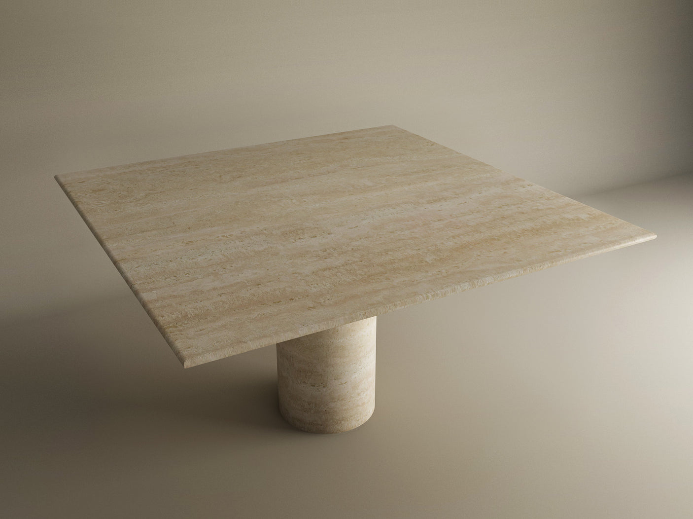 The TRAVERTABLE Square Travertine Dining Table features a thick, flat top and cylindrical center base in pure travertine stone, with hand-finished details and unique natural veining. Customizable design against a neutral backdrop.