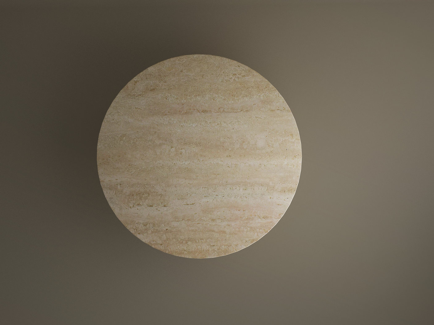 An oval travertine dining table by TRAVERTABLE, crafted from pure travertine stone with a cylindrical center base, is seen from above on a plain background. The natural marbled surface and color variations add elegance to any dining space.