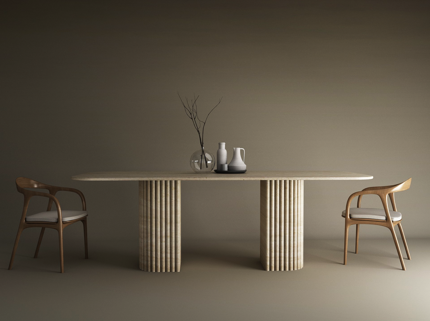 A minimalist dining scene features the TRAVERTABLE Rectangular Travertine Dining Table with Fluted Round Base, solid travertine stone base, two wooden chairs with light cushions, and simple vases with a branch centerpiece against a neutral backdrop.
