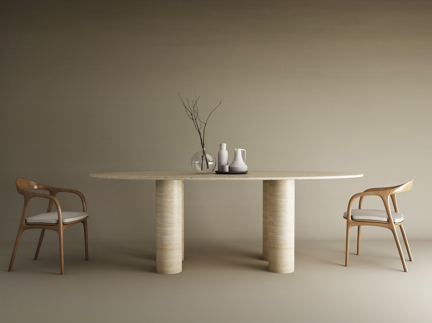 A minimalist dining setup features TRAVERTABLEs Ellips Travertine Dining Table with Cylindrical Base, two wooden chairs with white cushions, and ceramic vases with bare branches, all set against a neutral beige background.