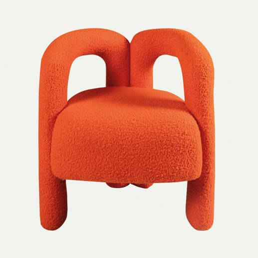 Introducing the Bold Bliss Lounge Chair by Travertable: a modern piece with vibrant orange, textured fabric and ergonomic design. Its unique rounded, loop-like legs and backrest create a sculptural look against a crisp white background.