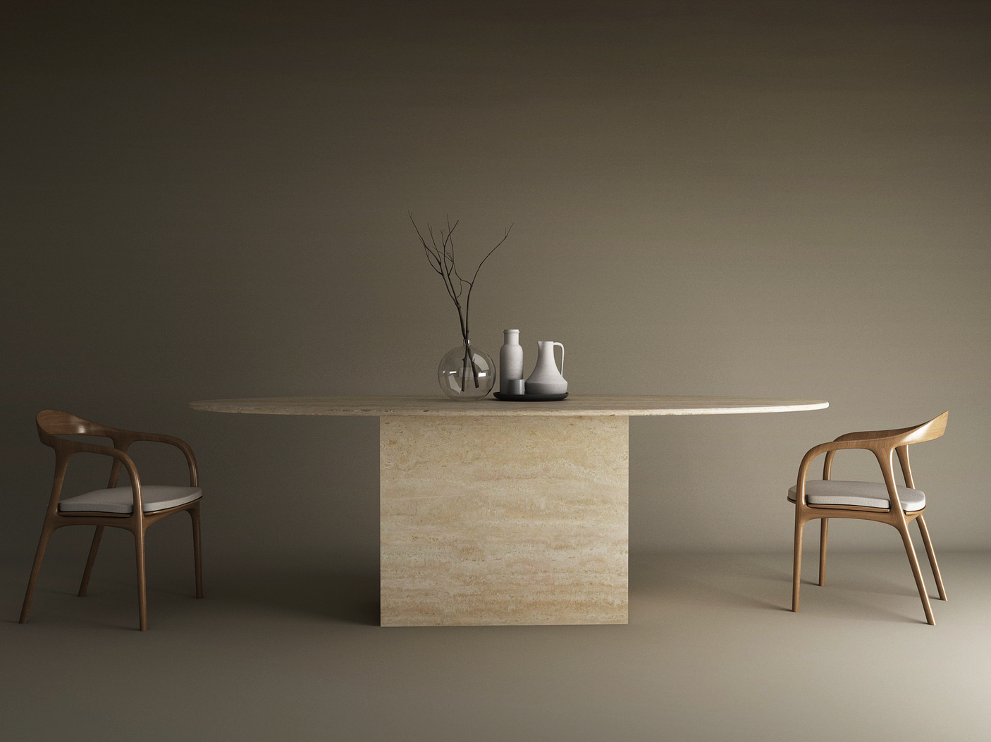 A minimalist room centers the TRAVERTABLE Ellips Travertine Dining Table with Block Base, flanked by wooden chairs with white cushions and styled with two white vessels plus a glass vase of bare branches.