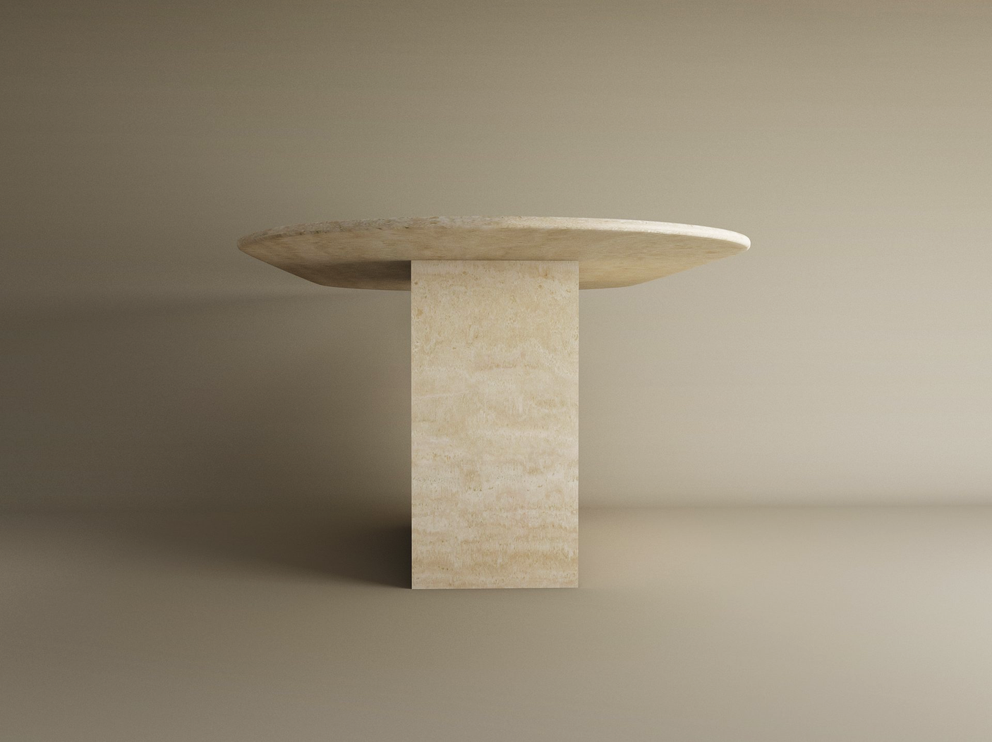 The TRAVERTABLE Oval Travertine Dining Table features a smooth, beige natural stone top with subtle patterns and a sturdy block base. Customizable and elegant, this heirloom-quality table stands out against a neutral background.