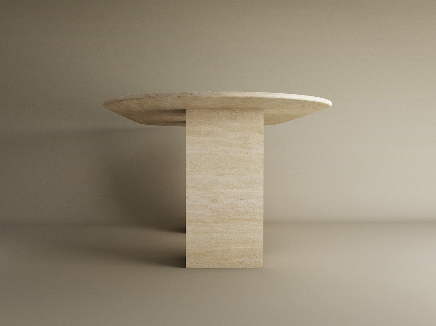 The TRAVERTABLE Oval Travertine Dining Table features a natural stone tabletop and a sturdy rectangular travertine base, creating an elegant heirloom piece perfect for any dining space. Customizable to suit your style.