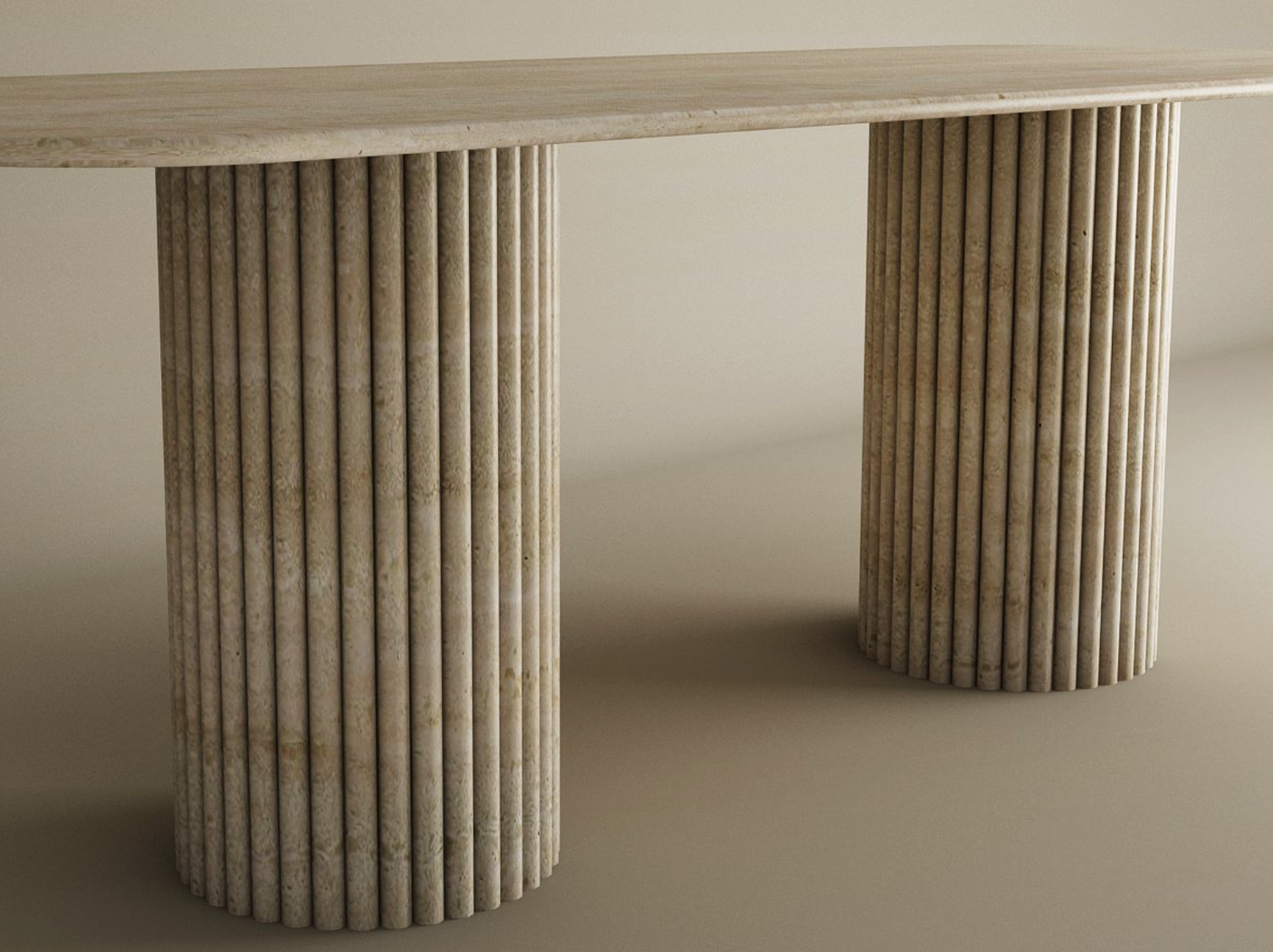 The TRAVERTABLE Rectangular Travertine Dining Table features a natural stone top and two large, fluted, column-style bases with vertical grooves in a light beige marble-like finish—an elegant, customizable heirloom piece.