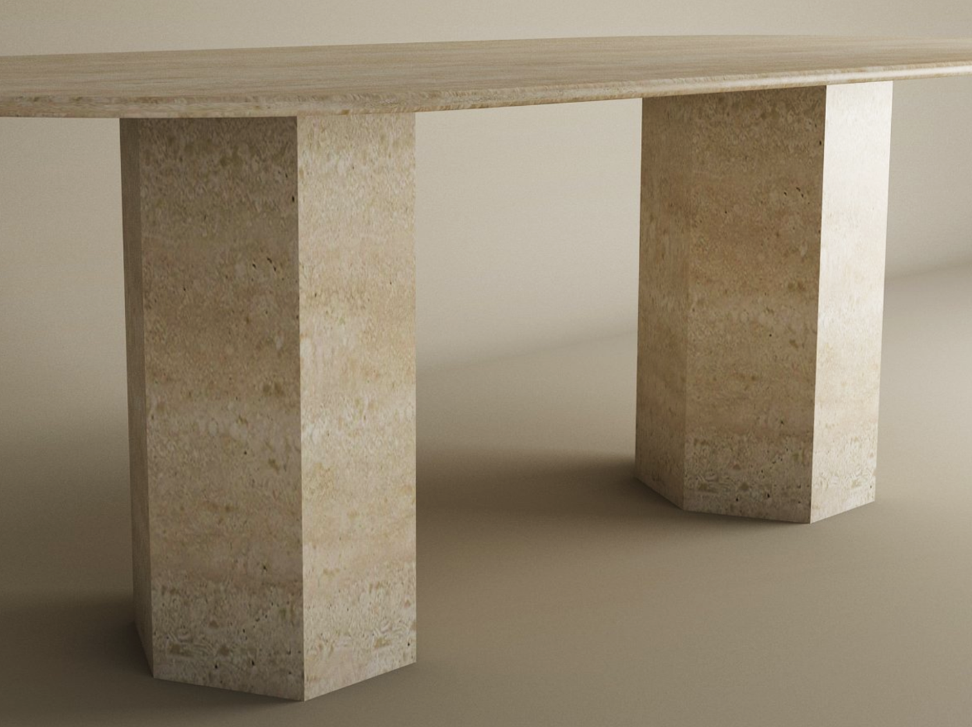 The TRAVERTABLE Oval Travertine Dining Table features a natural stone tabletop and a hexagonal organic stone pedestal base in beige with a textured finish. The background is plain and neutral. Customization available.