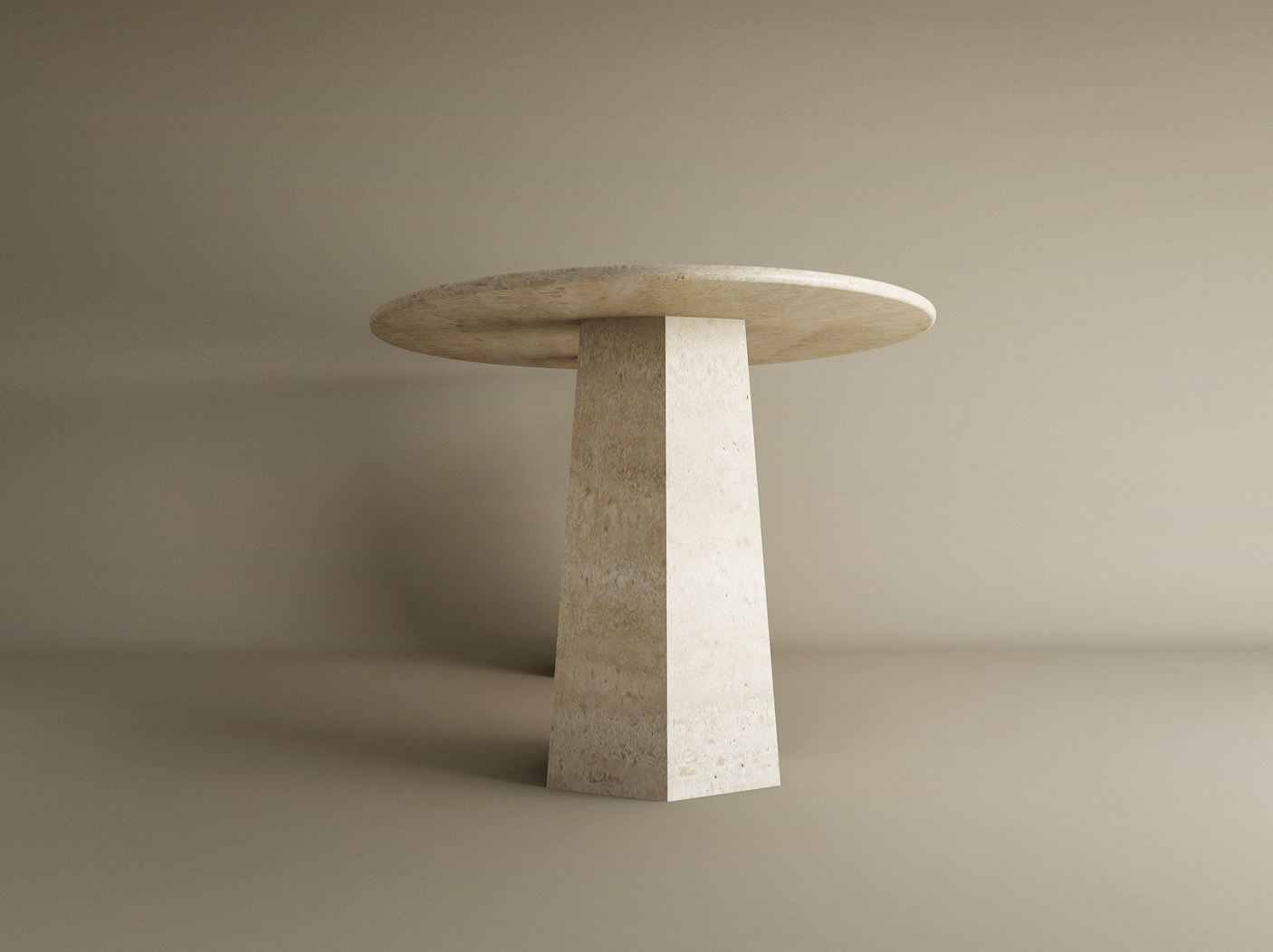 The TRAVERTABLE Ellips Travertine Dining Table features a thick, round beige stone top and a wide, tapered solid travertine base, set against a neutral background. This customizable heirloom piece adds elegance to any dining space.