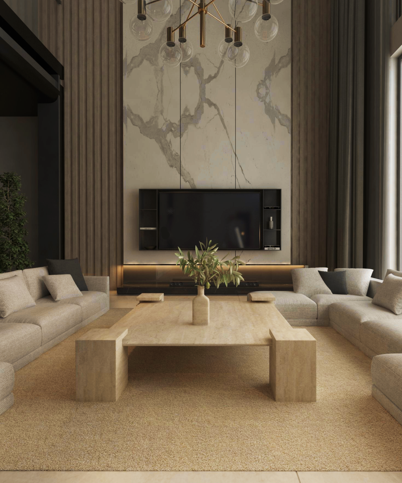 A modern living space with neutral tones features two beige sofas facing the TRAVERTABLE Square Travertine Coffee Table with Square Base. A TV is mounted on a marble accent wall with black shelves, and a minimalist chandelier hangs above tall, sunlit windows.