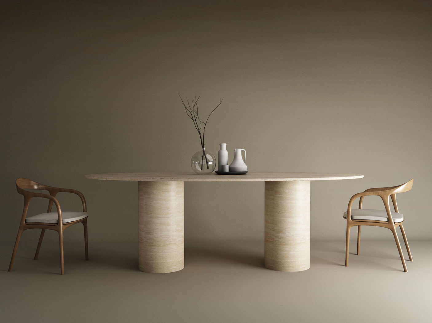 Minimalist dining setup showcasing the TRAVERTABLE Ellips Travertine Dining Table with a smooth cylinder base and pure travertine stone, paired with two wooden chairs with white cushions and decorative vases against a neutral beige background.