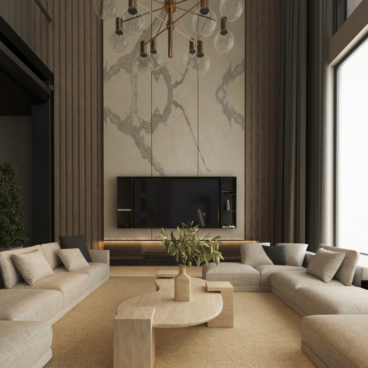 A modern living room with beige sectionals, a light tan rug, and the TRAVERTABLE Wavy Travertine Coffee Table with Square Base. A large TV is on a marble accent wall with vertical panels, black shelves, a gold chandelier, and large windows complete the look.