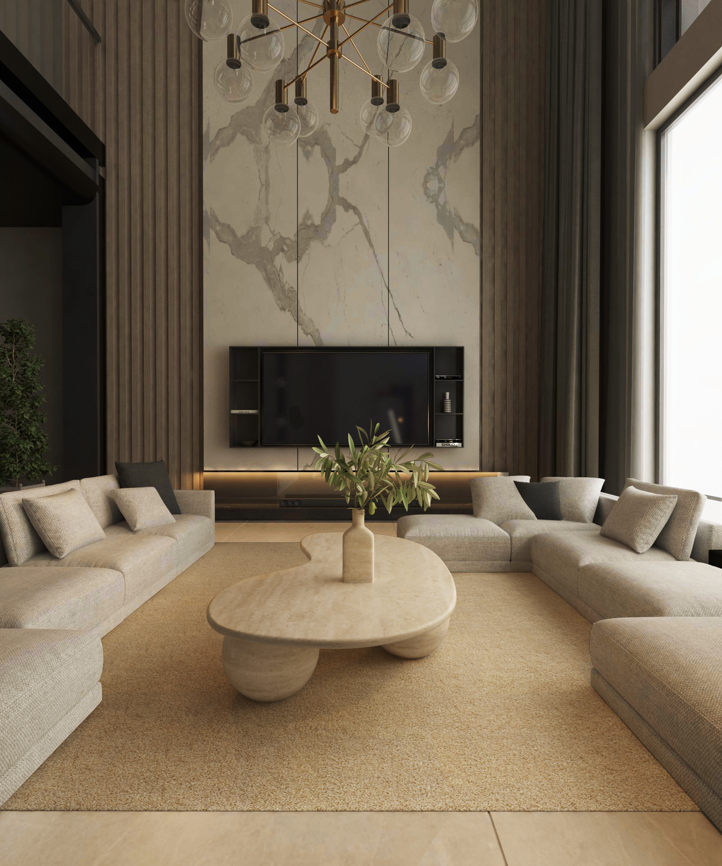 A modern living room features beige sofas in a U-shape around the TRAVERTABLE Wavy Travertine Coffee Table with Stone Ball Base and Organic Sculpture (Customizable). A large TV sits on a marble wall flanked by shelves, with tall windows filling the space with light.