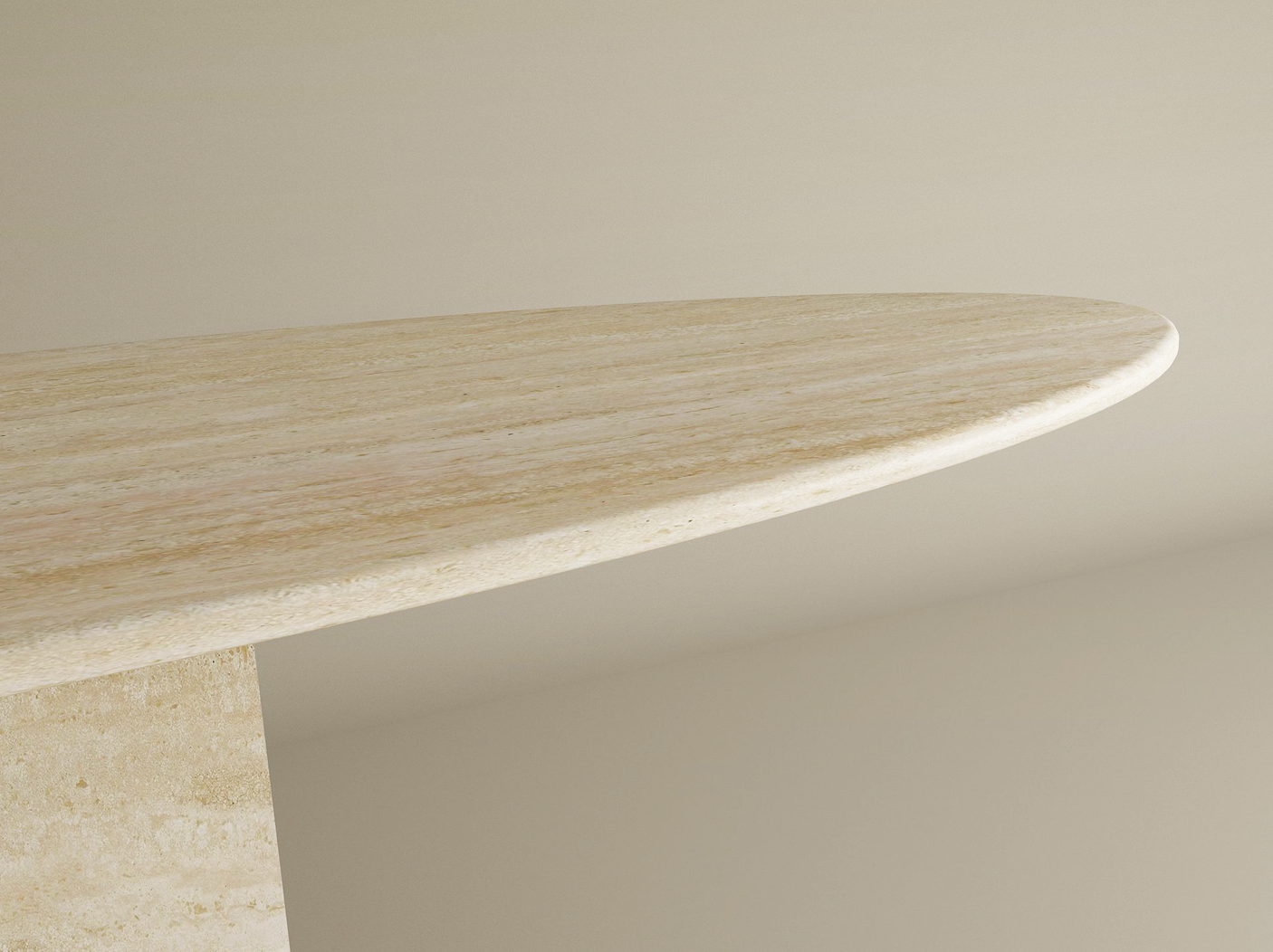 Close-up of the TRAVERTABLE Ellips Travertine Console Table with Block Base, showcasing its light natural stone finish, oval shape, vertical block base, and subtle textures against a plain beige background. Customizable design available.