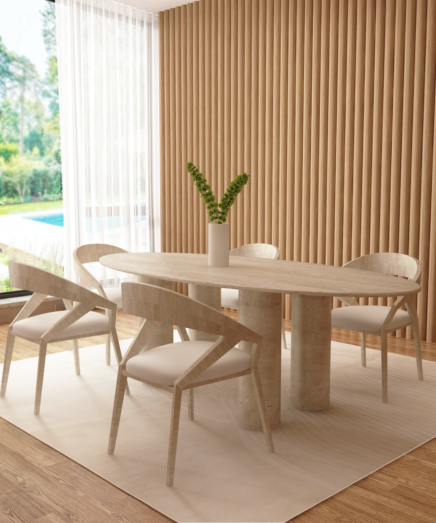 A modern dining room features the TRAVERTABLE Ellips Travertine Dining Table with a pure stone base, four white-cushioned chairs, a tall vase with greenery, a white rug, wood-paneled wall, and a large window framing outdoor foliage.