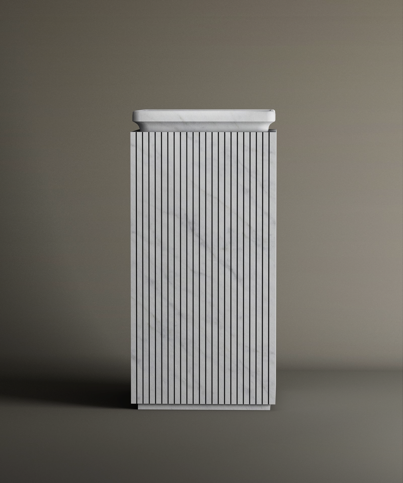 The TRAVERTABLE Carrara Square Marble Pedestal Vanity Sink, featuring vertical grooves and subtle grey veining, stands against a plain backgroundβits refined design perfect for sophisticated interiors.