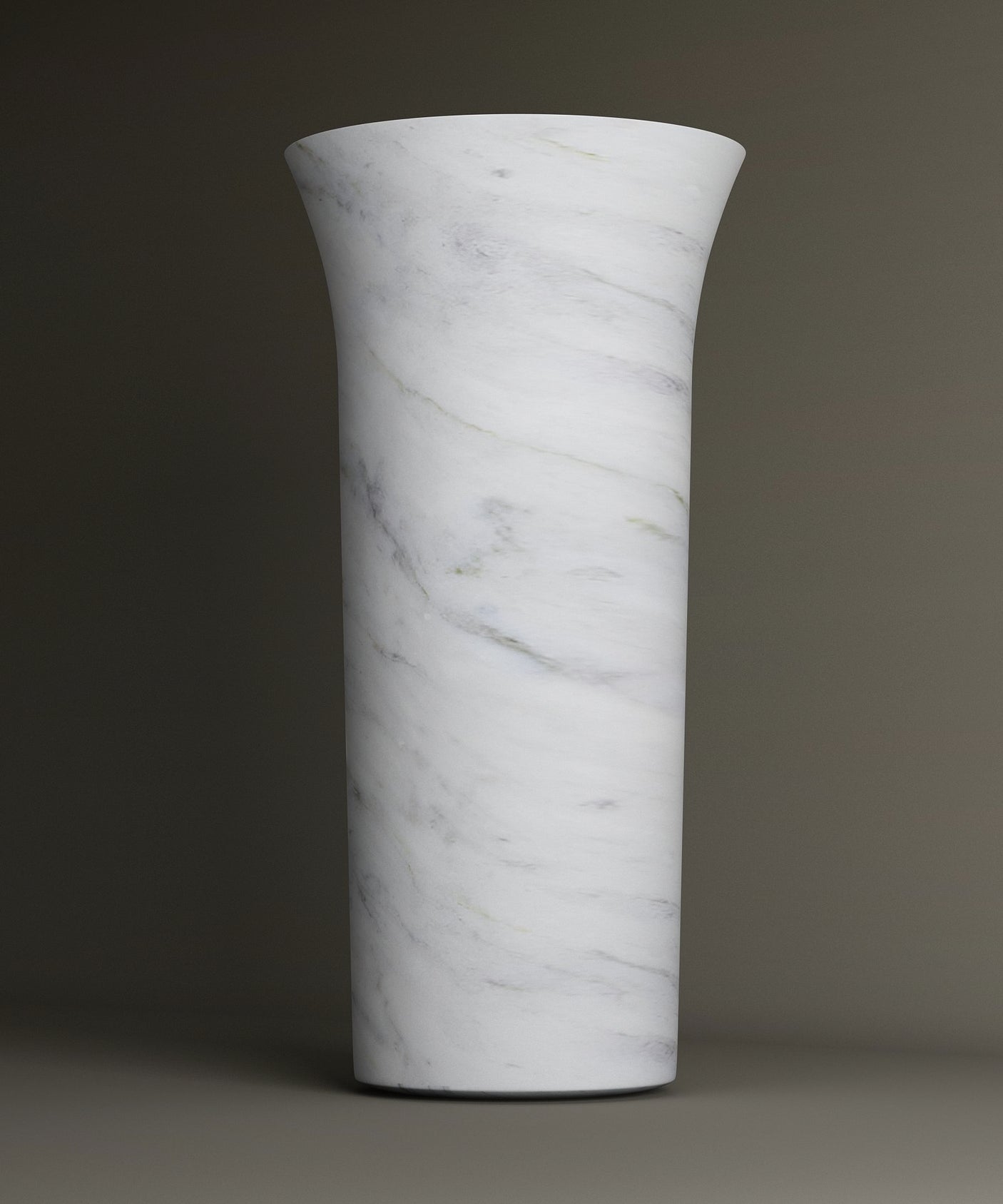 A tall, cylindrical white vase with gray veining and a flared rim stands out, echoing the elegance of TRAVERTABLE’s Carrara Marble Cylinder Pedestal Vanity Sink. Its smooth surface and clean lines reflect sophisticated style.