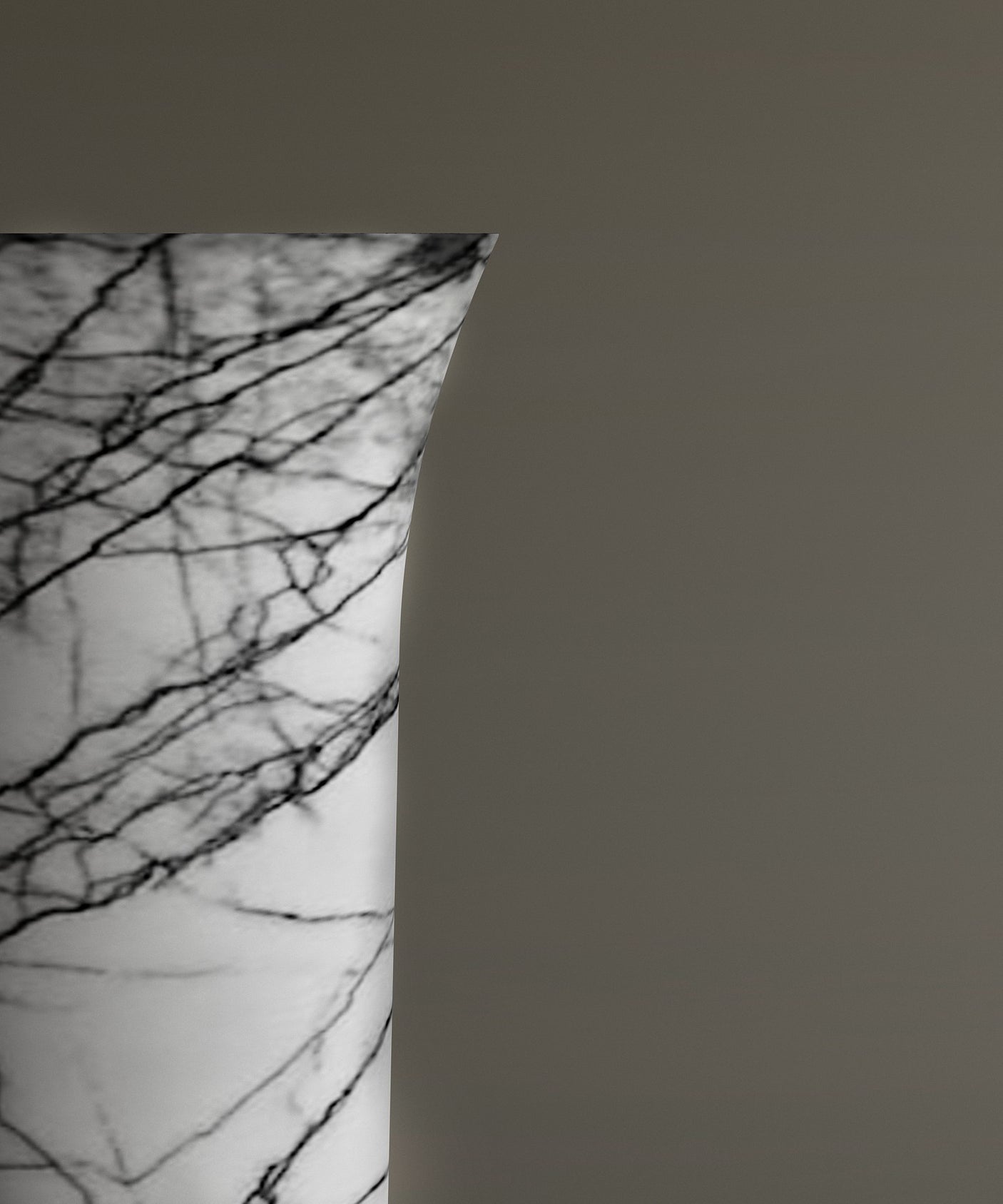 A close-up of the TRAVERTABLE Lilac Marble Cylinder Pedestal Vanity Sink, featuring bold veining, is positioned on the left against a plain taupe background.