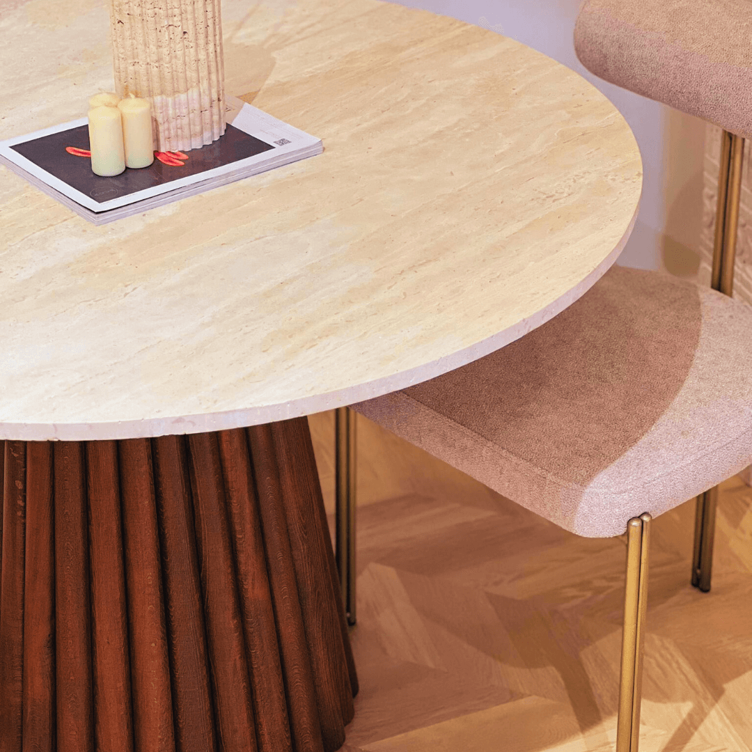 The Walnut Leg Round Travertine Dining Table